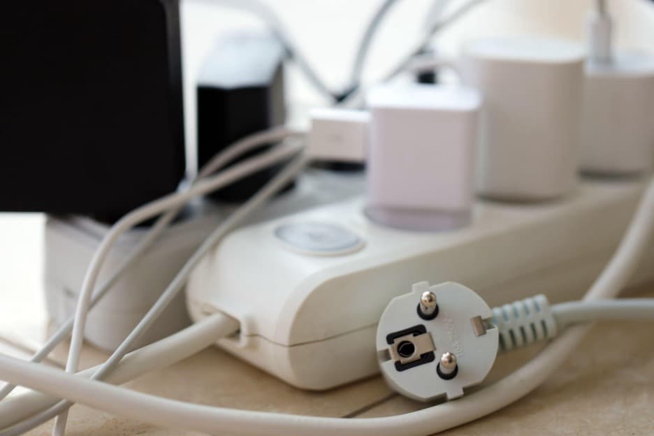 Power strip with several plugged-in appliances