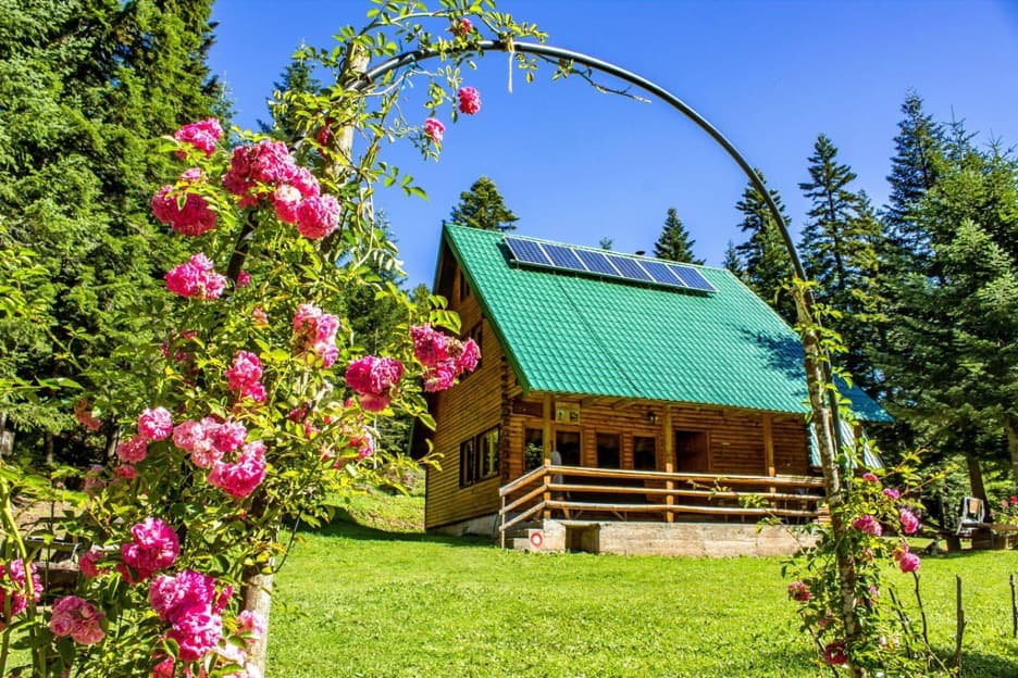 Holiday cottage with solar panels on the roof